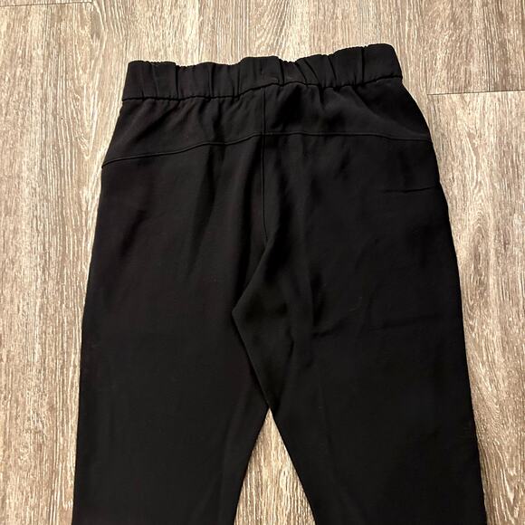EUC Lululemon On the Fly 7/8 Pant Stretch High-Rise Black Sz 6 Minimalist Jogger - Picture 8 of 16